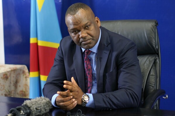 FILE - Corneille Nangaa, president of the independent electoral commission, speaks to reporters, Dec. 24, 2018, in Kinshasa, Democratic Republic of the Congo. Nangaa was one of the 25 people sentenced to death by a Congolese military court Thursday, Aug. 8, 2024. (AP Photo/Jerome Delay, File)