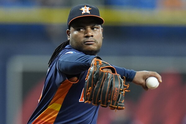 Houston Astros starting pitcher Framber Valdez delivers to the Tampa Bay Rays during the first inning of a baseball game Monday, Aug. 12, 2024, in St. Petersburg, Fla. (AP Photo/Chris O'Meara)