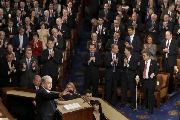 FILE - Israeli Prime Minister Benjamin Netanyahu speaks March 3, 2015, before a joint meeting of Congress on Capitol Hill in Washington. Democratic lawmakers in the House and Senate are wrestling with whether to attend Netanyahu's address to Congress on July 24, 2024. Many are torn between their long-standing support for Israel and their anguish about the way Netanyahu's government has waged war in Gaza. (AP Photo/J. Scott Applewhite, File)