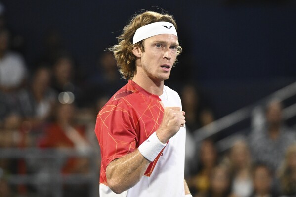 Andrey Rublev of Russia reacts during his quarter-final match against Jannik Sinner of Italy at the National Bank Open tennis tournament in Montreal, Saturday, August 10, 2024. (Graham Hughes/The Canadian Press via AP)