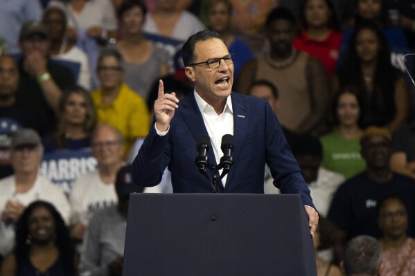 Pennsylvania Gov. Josh Shapiro speaks before Democratic presidential nominee Vice President Kamala Harris and her running mate Minnesota Gov. Tim Walz during a campaign event in Philadelphia, Tuesday, Aug. 6, 2024. (AP Photo/Joe Lamberti)