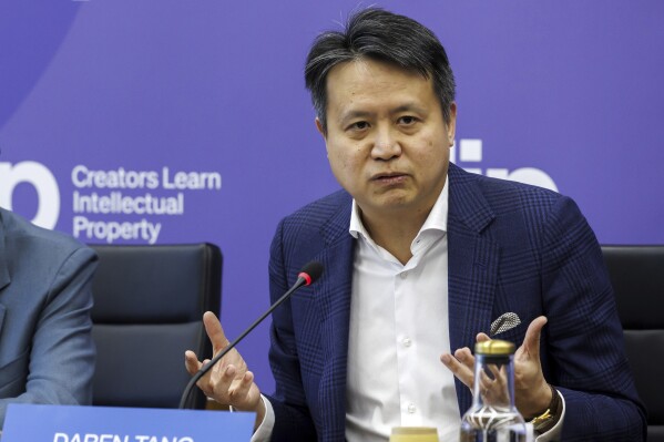 FILE - Director General the World Intellectual Property Organization (WIPO) Daren Tang speaks during a press conference at the headquarters of the World Intellectual Property Organization (WIPO), in Geneva, Switzerland, Friday, Nov. 17, 2023. China has far and away requested the most patents in the world when it comes to generative AI, the U.N. intellectual property agency said Wednesday, July 3, 2024, trailed by the United States in distant second. (Salvatore Di Nolfi/Keystone via AP, File)