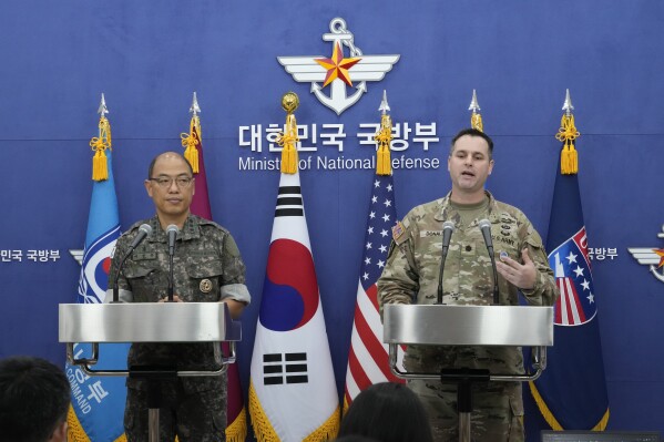 Col. Ryan Donald, right, CFC/UNC/USFK Public Affairs Director, and Col. Lee Sung-jun of South Korea's JCS Public Affairs Director, attend a press briefing of the Ulchi Freedom Shield exercises at the Defense Ministry in Seoul, South Korea, Monday, Aug. 12, 2024. (AP Photo/Ahn Young-joon)