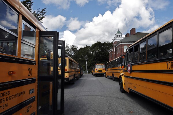 In this Thursday, Sept. 14, 2017, file photo, buses await students at York Middle School in York, Maine. (AP Photo/Robert F. Bukaty, File)