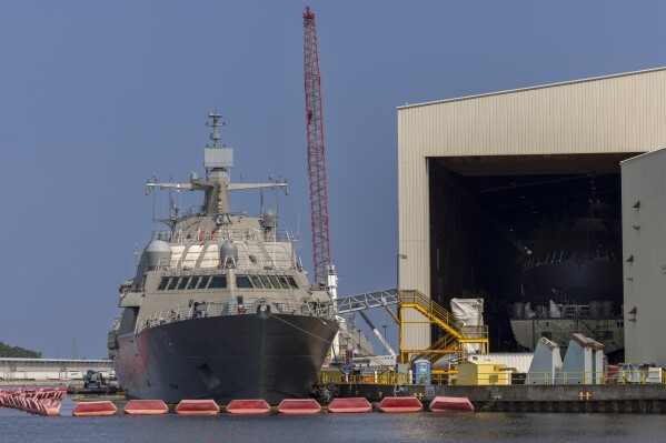 A ship under construction sits docked at Fincantieri Marinette Marine Friday, July 12, 2024, in Marinette, Wis. (AP Photo/Mike Roemer)