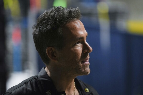 Wrexham co-owner, actor Ryan Reynolds, arrives to watch the team play an international friendly soccer match against the Vancouver Whitecaps in Vancouver, British Columbia, Saturday, July 27, 2024. (Darryl Dyck/The Canadian Press via AP)