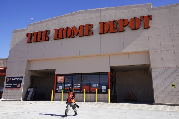 FILE - A view of the exterior of the Home Depot improvement store, in Niles, Ill., on Feb. 19, 2022. Home Depot reports earnings on Tuesday, Nov. 14, 2023. Home Depot's sales rose slightly in its fiscal second quarter as the country's biggest home improvement retailer saw gains from a recent acquisition, but it continues to be squeezed by customers watching their spending due to prolonged high interest rates. (AP Photo/Nam Y. Huh, File)