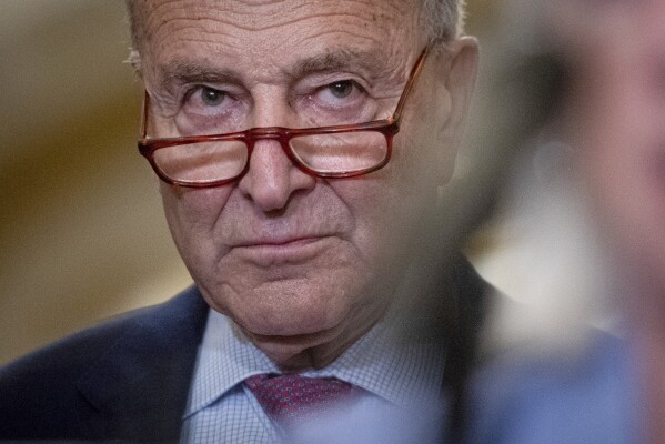 Senate Majority Leader Chuck Schumer, speaks with reporters on Capitol Hill in Washington, Tuesday, July 9, 2024. (AP Photo/Cliff Owen)