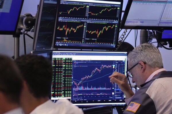 Traders work on the floor of the New York Stock Exchange, Tuesday, Aug. 6, 2024.(AP Photo/Richard Drew)