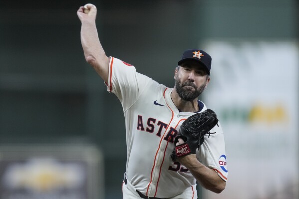 FILE - Houston Astros starting pitcher Justin Verlander throws during a simulated game Sunday, Aug. 4, 2024, in Houston. (AP Photo/Kevin M. Cox, File)