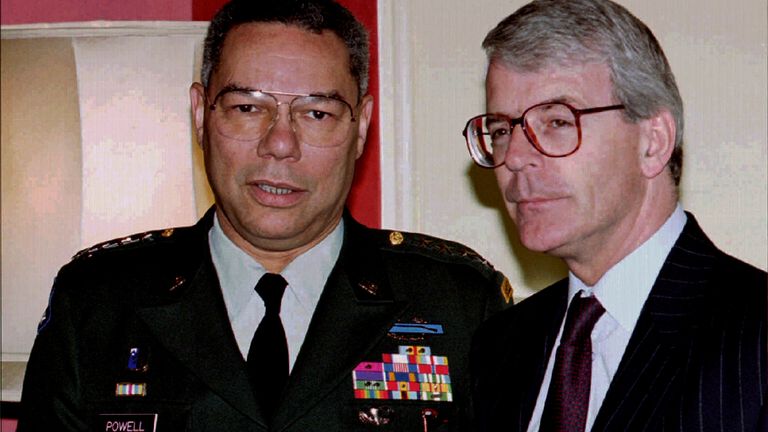 Prime Minister John Major (R) stands with General Colin Powell, chairman of the US Joint Chiefs of Staff, before talks at Major's 10 Downing Street office May 24. Powell is on a one-day visit to Britain
