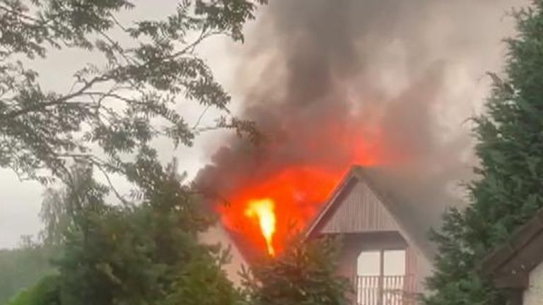 House goes up in flames after being hit by lightning