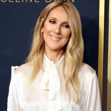 celine dion smiling and tilting her head to the left