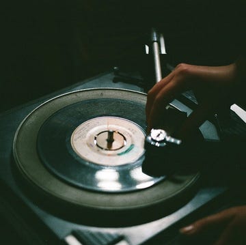 a person holding a record