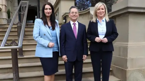 Deputy First Minister Emma Little-Pengelly, Chinese ambassador Zheng Zeguang and First Minister Michelle O'Neill at Stormont Castle