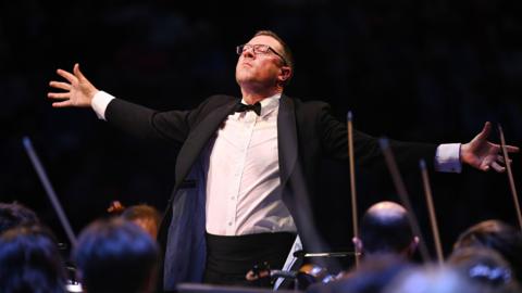 John Wilson conducting