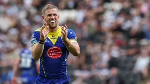 Warrington Wolves' Matthew Dufty celebrates during a Betfred Super League match