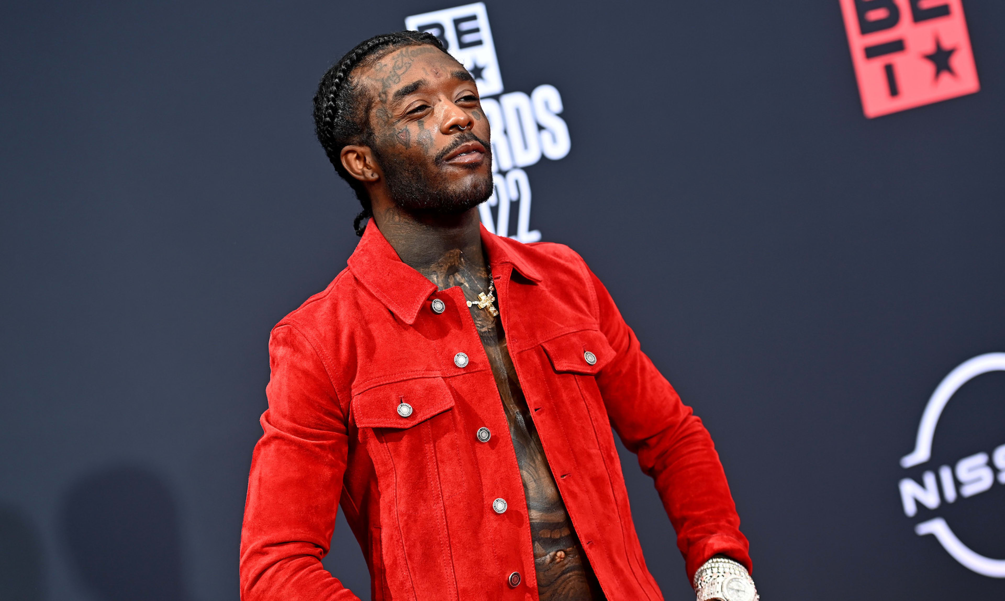 Lil Uzi Vert on red carpet wearing red