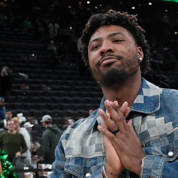 Feb 4, 2024; Boston, Massachusetts, USA; Memphis Grizzlies guard Marcus Smart (36) gestures to fans after a game against the Boston Celtics at TD Garden. 