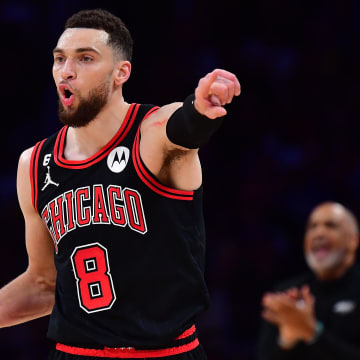 Mar 26, 2023; Los Angeles, California, USA; Chicago Bulls guard Zach LaVine (8) controls the ball against the Los Angeles Lakers during the second half at Crypto.com Arena. =