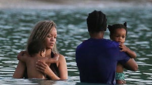 Rihanna And ASAP Rocky With Their Kids In The Ocean In Barbados