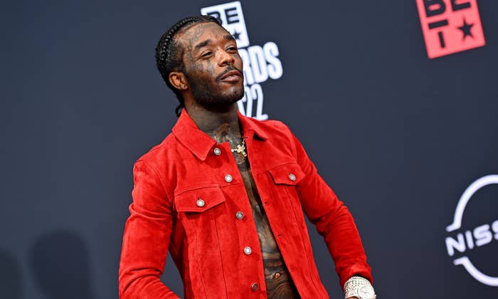 Lil Uzi Vert on red carpet wearing red