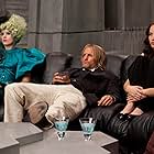 Woody Harrelson, Elizabeth Banks, and Jennifer Lawrence in The Hunger Games (2012)