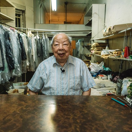 Robert Lee inside Sun's Laundry, his business of 61 years on the Lower East Side of New York City.