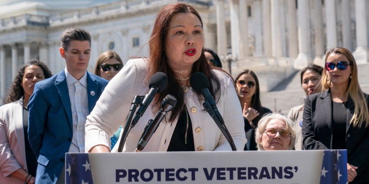 Tammy Duckworth speaks with reporters 