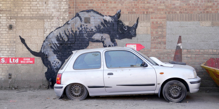 Image: banksy art rhinoceros rhino