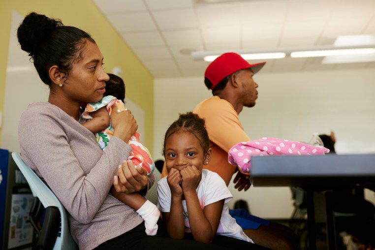 Areleidis Chiquillo with her two-month-old and her 5-year-old daughter.