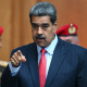 Venezuelan President Nicolas Maduro leaves a news conference about the presidential election at the Miraflores presidential palace in Caracas on July 31, 2024.