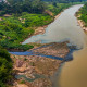 Blackwater, left, pollutes the Acre River near Rio Branco.