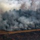 Smoke billows from a patch of forest being cleared with fire in the Amazon basin in northwestern Brazil