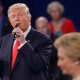 Donald Trump and Hilary Clinton participate in a town hall debate in St. Louis, Missouri, on October 9, 2016. 