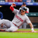 Boston Red Sox's Jarren Duran slides safely across home plate