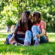 Freed Russian artist Sasha Skochilenkonand her partner, Sofya Subbotina kiss in a park in Koblenz, Germany, on August 10, 2024.