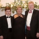 Alex Murdaugh in court on Oct. 19, 2021, and with his wife and son, Margaret and Alex.