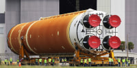 The Core Stage for NASA's Space Launch System rocket is moved from the Pegasus barge to the Vehicle Assembly Building on July 23, 2024.