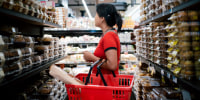 Woman shopping for groceries in Brooklyn, N.Y.