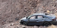 Peter Hayes Robino's car after rolling down an embankment in Death Valley, California. 