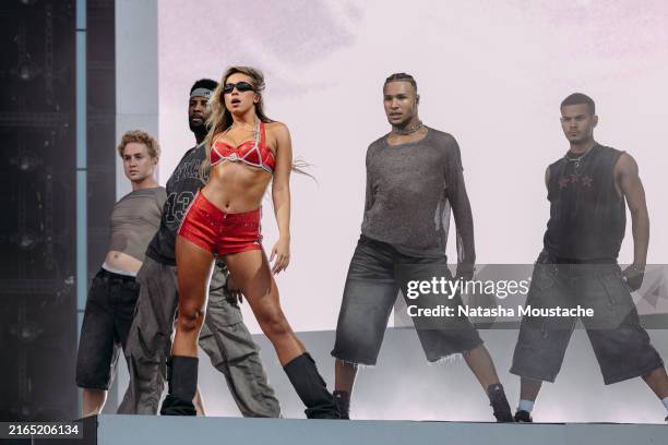 Tate McRae performs onstage during Lollapalooza at Grant Park on August 03, 2024 in Chicago, Illinois.