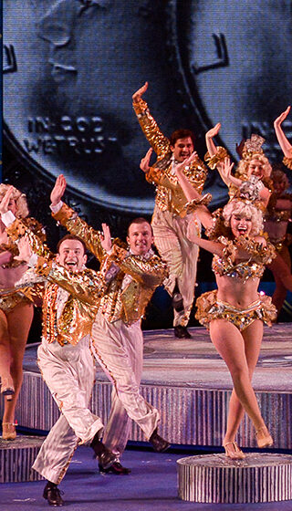 Performers dancing on the Muny stage