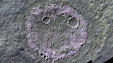 Smiley face on Mars is a telltale sign of its past