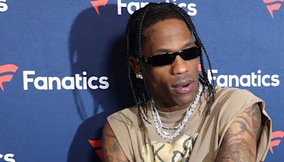 Travis Scott Unbothered With Mystery Woman At Olympic Games Amid Legal Woes