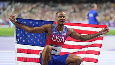 Olympic gold medalist, former COS runner Quincy Hall cheered on by college coach