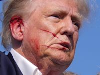 The man who photographed a bloodied and defiant Trump says he knew it was a moment in American history that had to be documented