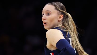 Getty Images - CLEVELAND, OHIO - APRIL 05: Paige Bueckers #5 of the UConn Huskies looks on in the first half during the NCAA Women's Basketball Tournament Final Four semifinal game against the Iowa Hawkeyes at Rocket Mortgage Fieldhouse on April 05, 2024 in Cleveland, Ohio. (Photo by Steph Chambers/Getty Images)