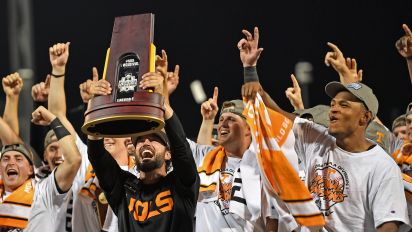 Getty Images - OMAHA, NE - JUNE 24:  Head coach Tony Vitello of the Tennessee Volunteers celebrates with the national championship trophy with his team, after defeating the Texas A&M Aggies in the NCAA Division I Baseball Championship on June 24, 2024 at Charles Schwab Field in Omaha, Nebraska.  (Photo by Peter Aiken/Getty Images)